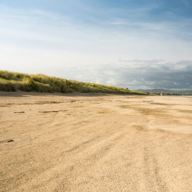 benone beach 375x375 - Zugreisen in Europa